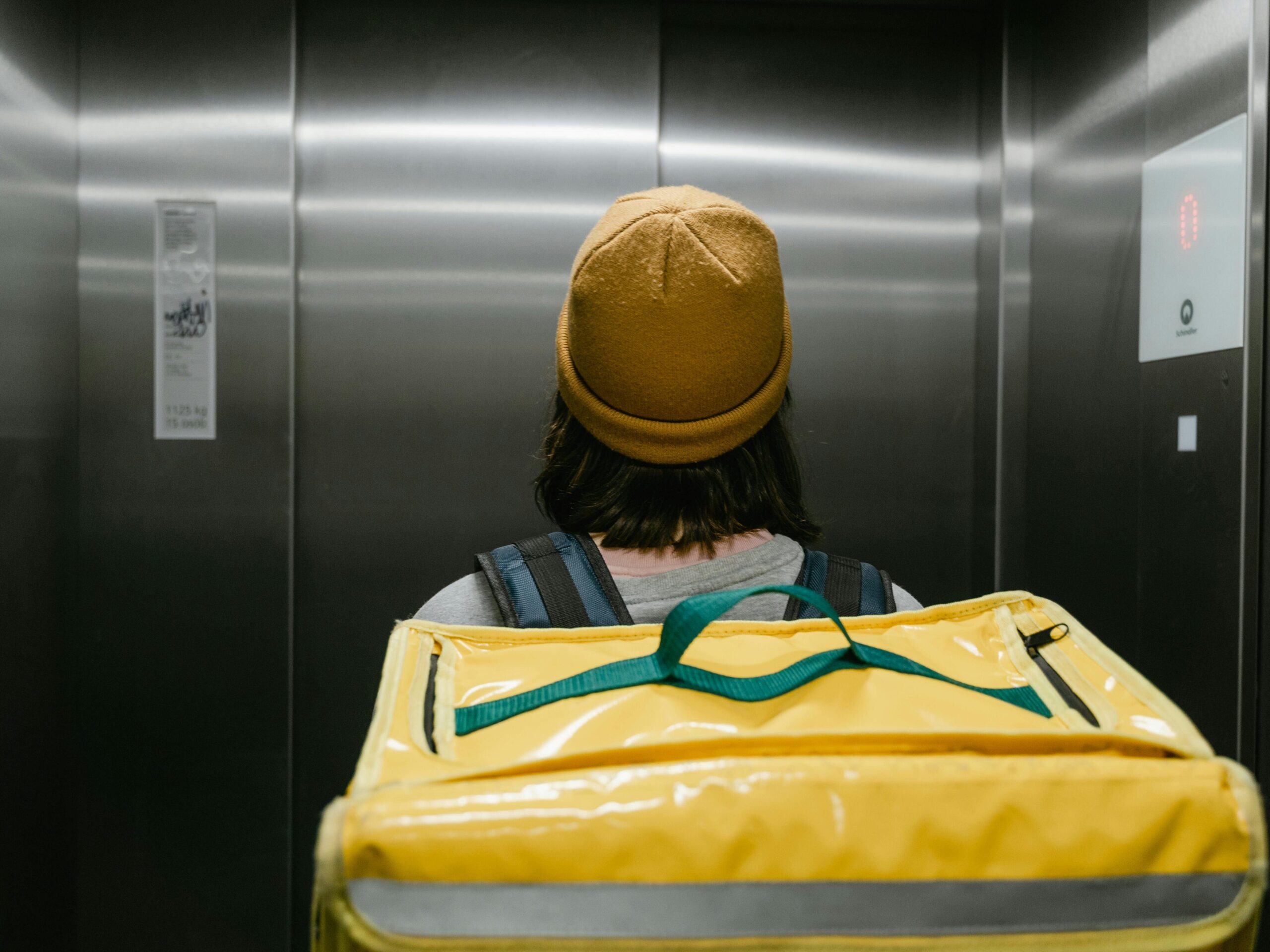 Woman Inside an Elevator